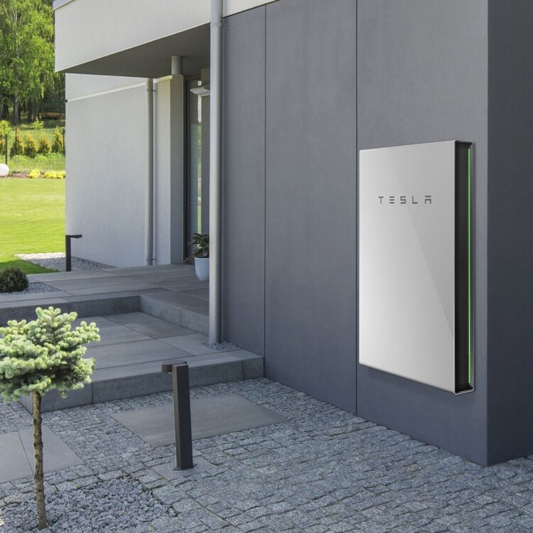 portland tesla powerwall hanging on the side of a home