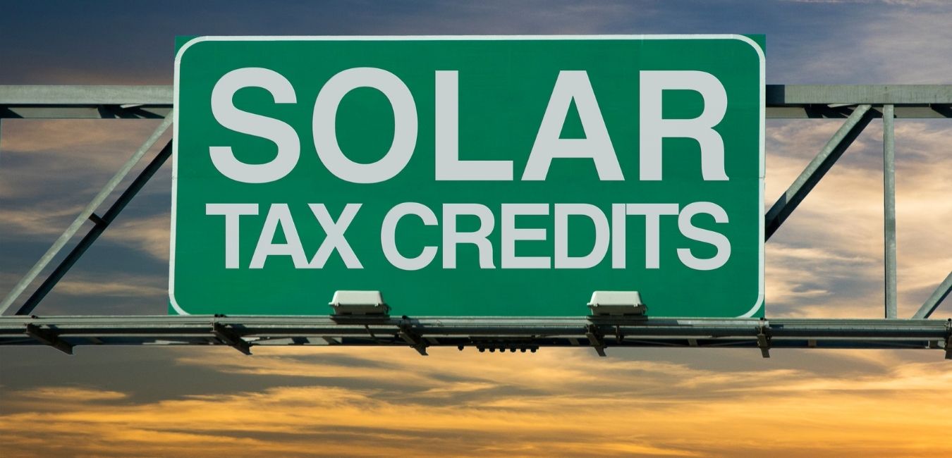 oregon solar energy tax credit sign above the freeway