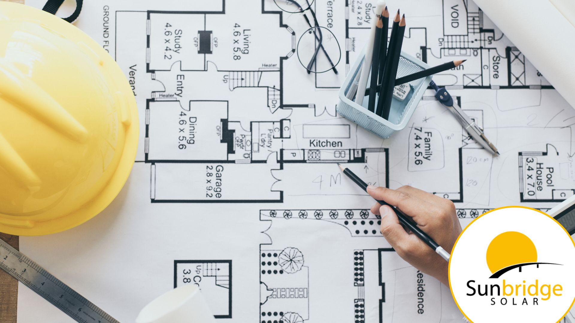 solar engineers looking over building permit